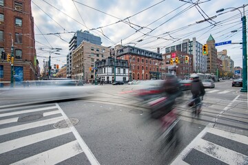 TORONTO, CANADA cyclists on King street West and Spadina Avenue 