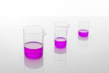 Purple solution in laboratory flasks