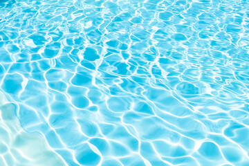Fototapeta na wymiar surface of blue swimming pool, background of water in swimming pool.