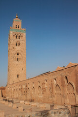 Koutoubia Mosque is the largest mosque in Marrakesh, Morocco, Africa. Located in the Jewish quarter, in the old Medina. The minaret tower is ornamented with curved windows, a band of ceramic inlay.