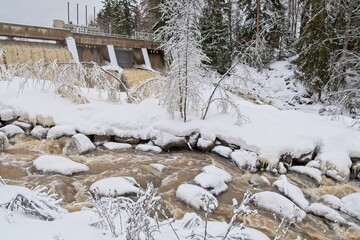 Dam in winter on river Porvoonjoki at Virtaala, Finland.