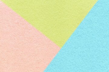 Texture of craft pink, blue and green shade color paper background. Structure of vintage abstract pastel cardboard