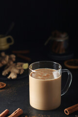 A cup with masala chai in low key