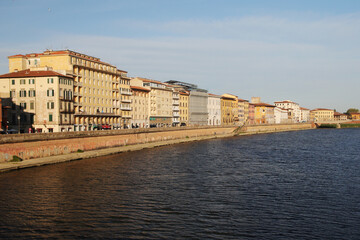 Old houses at the Arno river in Pisa, Italy