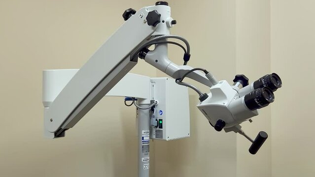 Ear, Nose, and Throat Exam room equipment. This is an ENT Microscope used by ENT physicians to look inside a patients ears, nose, and or throat during and examination.