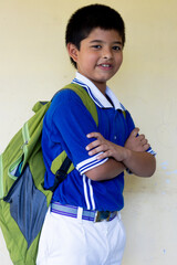 Portrait of school kid boy in uniform
