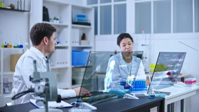 Lazy lab assistants chatting instead working, human skeleton on computer screen
