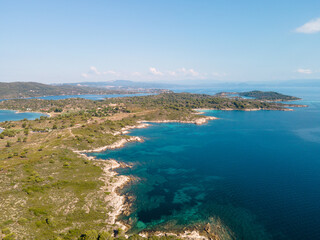 Naklejka na ściany i meble Aerial view of Diaporos Island in Halkidiki, Greece, Small islands with blue lagoon in the Aegean sea during summer holiday season