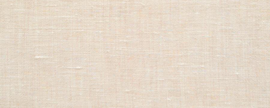 Beige or undyed linen fabric texture background