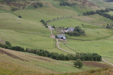 Fields with farm buildings in the rolling hills