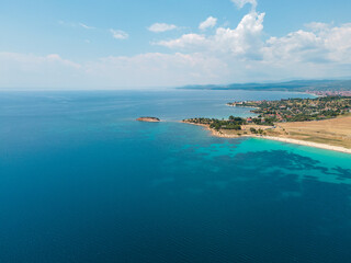 Fototapeta na wymiar Aerial view of turquoise sea waters in Sithonia, Greece