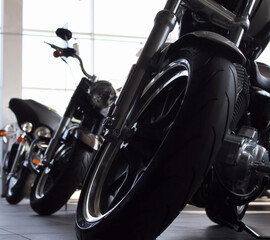 Cruise motorcycles in showroom of motorbike store
