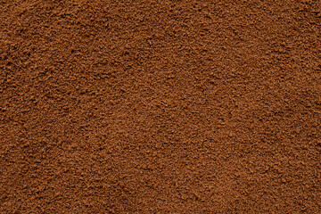 Background of instant coffee closeup, banner. Coffee powder texture, top view. Ground, instant...