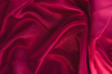 Elegant red silk or elegant satin can be used as a background.