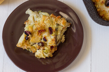 Savoy cabbage with au gratin cod.