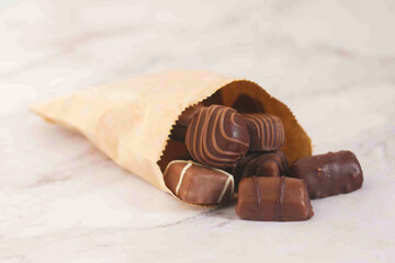 dark chocolate on a plate on table close up 