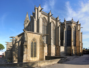 Panoramic view of the gothic basilica of St Nazaire with buttress construction and pointed windows in the old town of Carcassonne in France