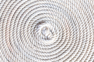 macro rope,Super close up of a thick rope in shape of a spiral,Photo of an old vintage rope. Natural warm light