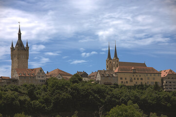 Fototapeta premium View of the old church and the historic town wall of Bad Wimpfen at summer