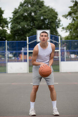 Obraz premium A Nineteen Year Old Teenage Boy Playing Basketball