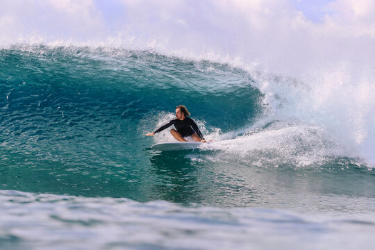Male surfer on a wave, Maldives