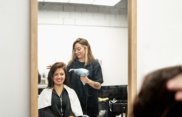Happy client at the hairdresser.
