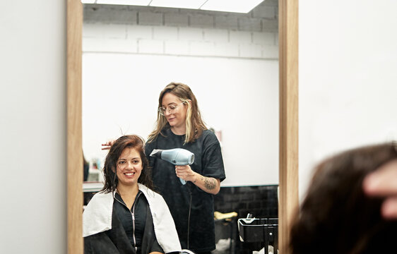 Happy client at the hairdresser.