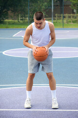 Obraz premium A Nineteen Year Old Teenage Boy Playing Basketball