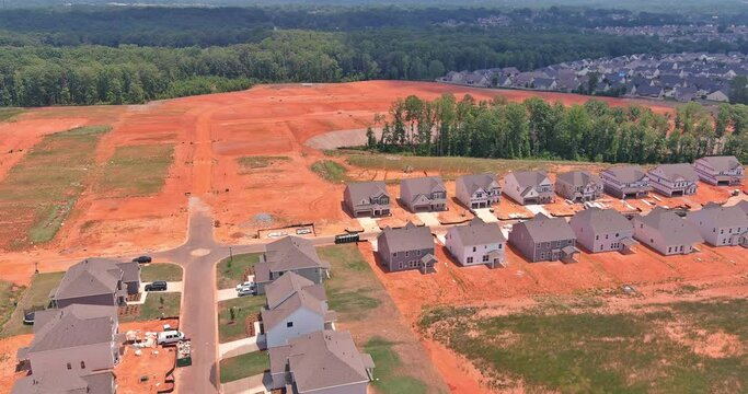 Unfinished subdivision housing complex construction site from an aerial perspective