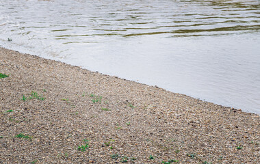 A beautiful river beach with pebbles stone