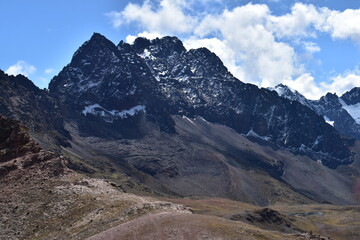The Rainbow Mountain Vinicunca (Montana de siete colores) and the valleys and landscapes around it in Peru