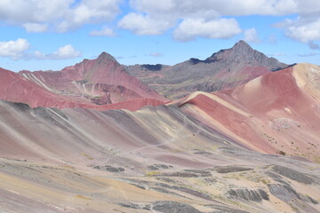 The Rainbow Mountain Vinicunca (Montana de siete colores) and the valleys and landscapes around it in Peru