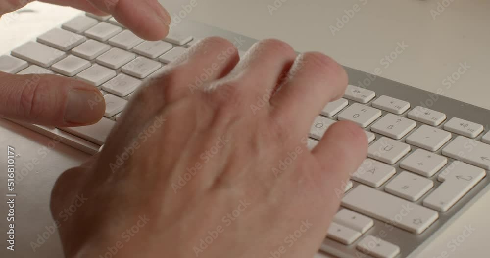 Poster man's hands fingers typing a message on the keyboard. he presses the buttons, sends an e-mail. commu
