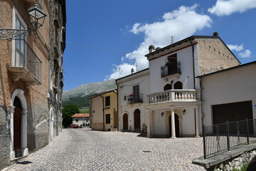 Fototapeta na wymiar A street among the old stone houses of Campo di Giove, a medieval village in the Abruzzo region of Italy.