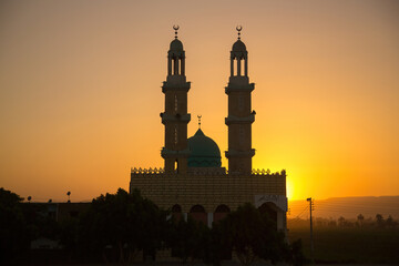 silhouette of a mosque at sunset