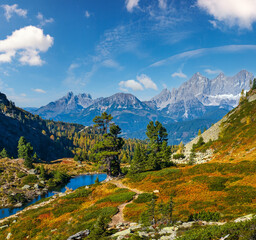 Fototapeta na wymiar Autumn Alps mountain lake Spiegelsee or Mittersee or Mirror Lake, Austria.