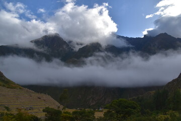 The dramatic landscapes of the Andes Mountains and cloud forests around the hiking path on the Inca Trail in Peru