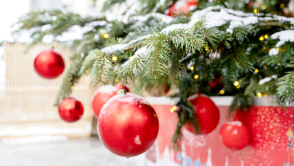 Decorated Christmas tree. Close-up of branches and decorative elements. Christmas green background.