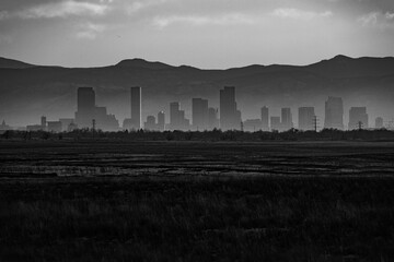 Monochrome, landscape shot of the downtown Denver, Colorado skyline, showing skyscrapers and...