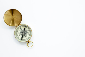 Golden vintag compass top view. Direction choice concept