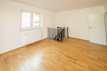 Cozy studio apartment design with bedroom and living space. Hotel room panoramic window, double bed, sofa and coffee table. Urban apartment concept