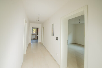 Cozy studio apartment design with bedroom and living space. Hotel room panoramic window, double bed, sofa and coffee table. Urban apartment concept