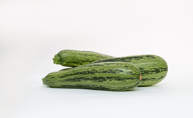 Zucchini on white background
