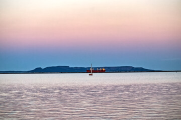 Calm colored waters of Lake Superior at dusk - Thunder Bay Marina, Ontario, Canada