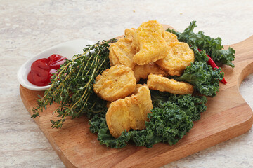 Crispy chicken nuggets with tomato ketchup