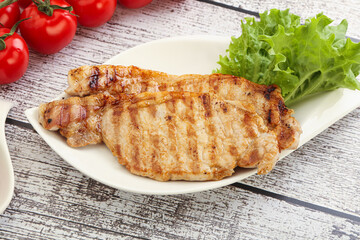 Grilled pork steak with ketchup