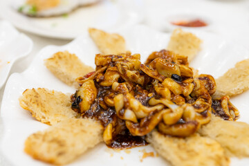 Fried razor clam dishes in restaurant