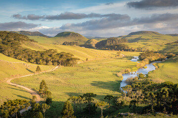 Dirt road and river, Landscape near Sao Jose dos Ausentes - southern Brazil