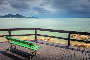 Seat bench pier in Santo Antonio de Lisboa beach Florianopolis, Brazil