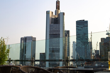 A sky lounge located at the top floor of Galeria Kaufhof shopping center, overlooking Frankfurt city financial center towers.